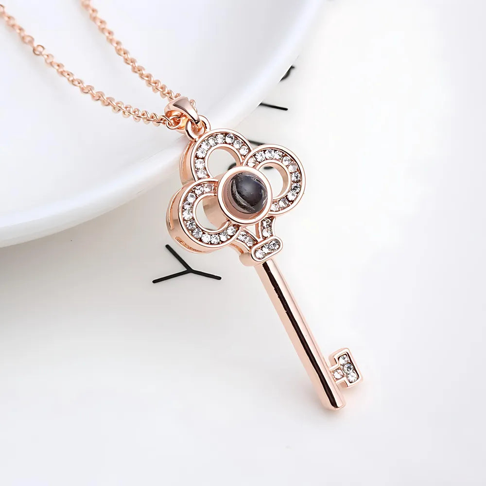 key-shaped custom photo projection necklace on clavicle chain