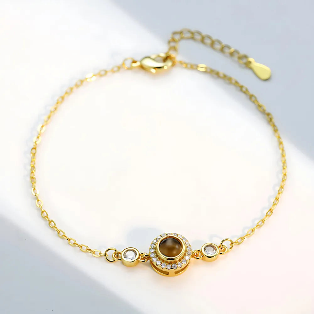 Gold Round birthstone bracelet with custom photo projection charm